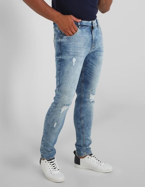 Jeans Contempo de caballero corte skinny, cintura media, con destrucciones  en SB